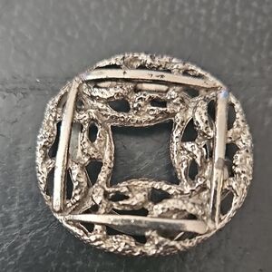 Vintage silver tone brutalist abstract scarf clip Silver Ornate Round Brooch 80s